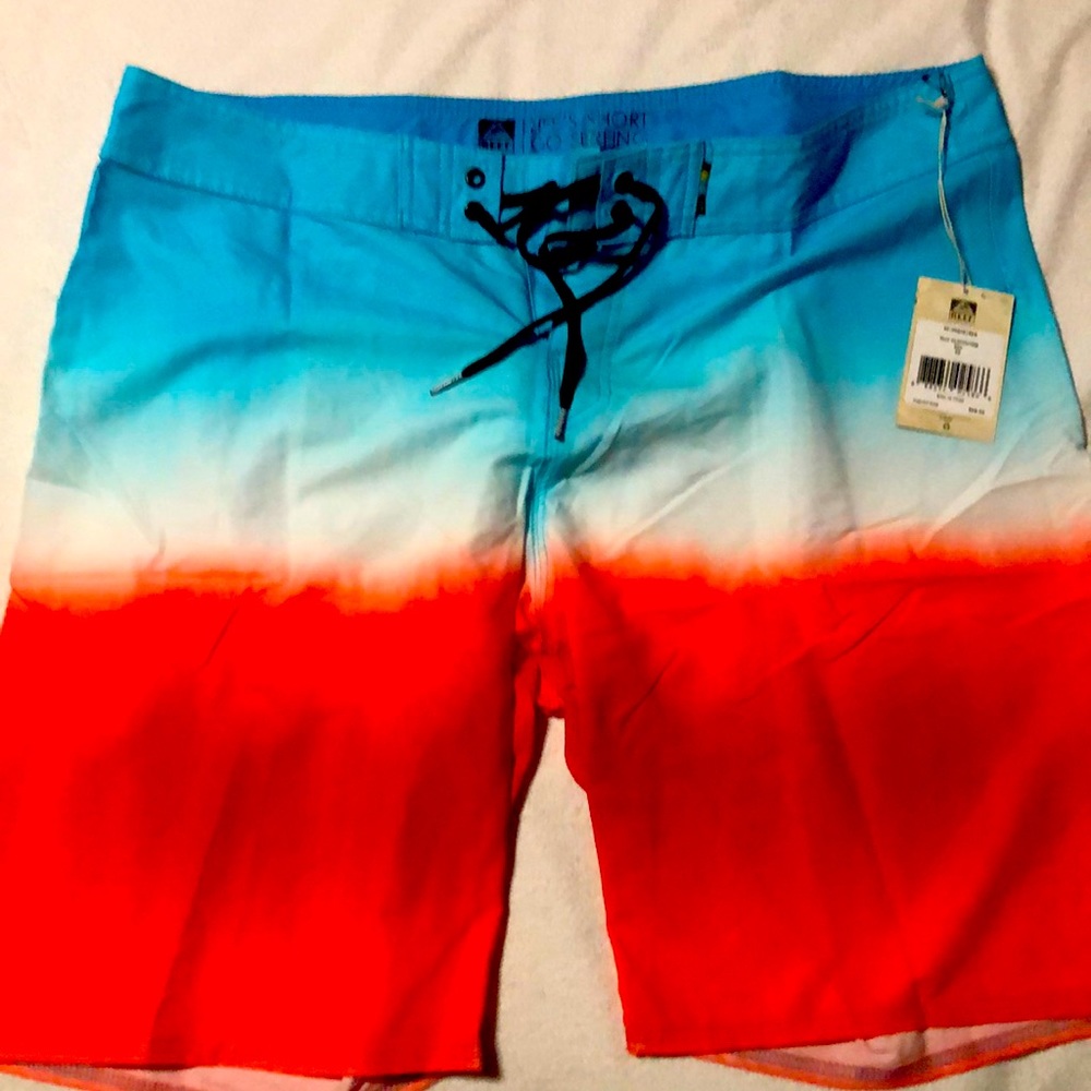 Surfing Shorts color blue, white and salmon
